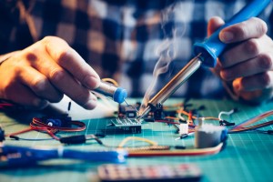 Details of Man working with electrial components